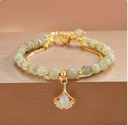 Amuleto de oro Jade