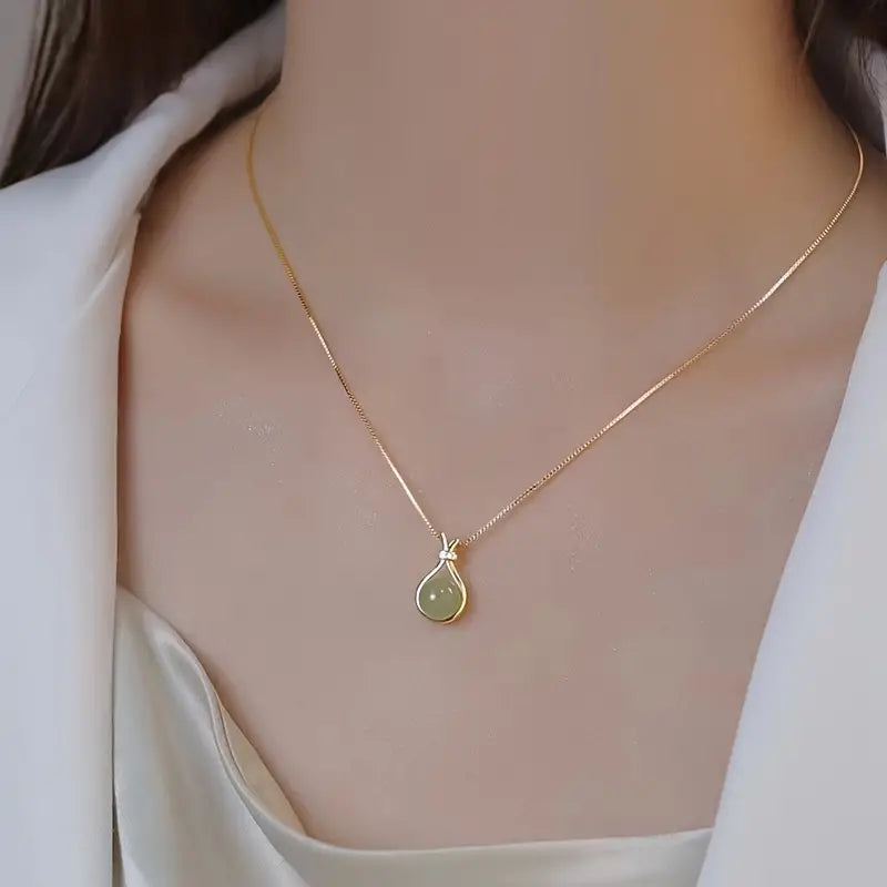colgante de oro jade