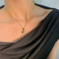 colgante de oro jade