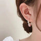 Aretes colgantes de diamante brillante