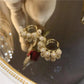 Aretes de borlas con diamantes incrustados
